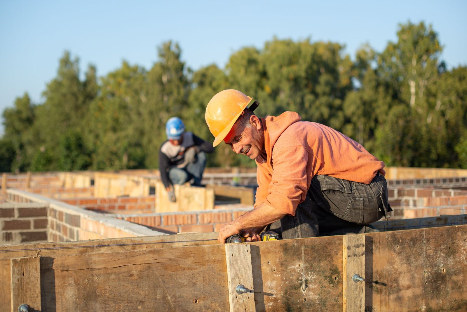 Construction worker on site wearing safety helmet